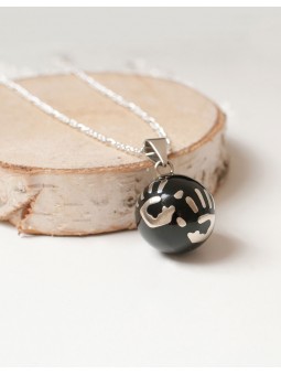 Bola de grossesse noir mains